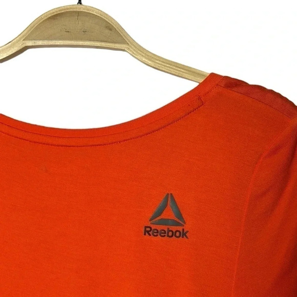 REEBOK. Orange activewear tee shirt . Logos ,scoop neckline , longer cap sleeve - Picture 6 of 7